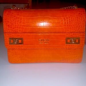 Orange crossbody Guess handbag 🧡